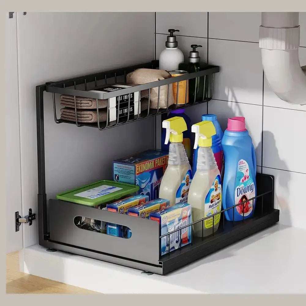 Under-sink organizer with pull-out basket storing cleaning supplies and toiletries for easy access.