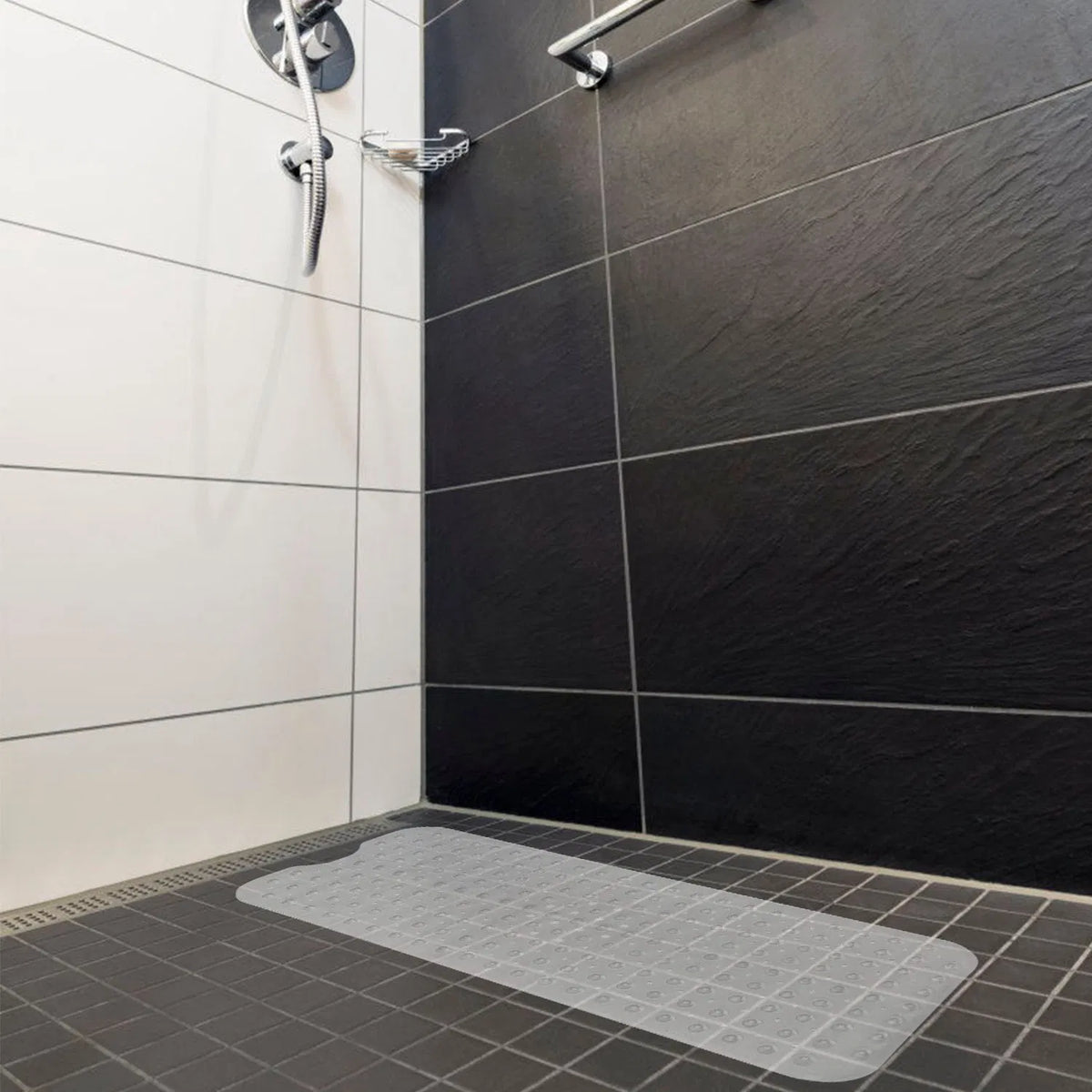 non-slip tub mat with suction cups in modern shower with pebble texture and drain holes