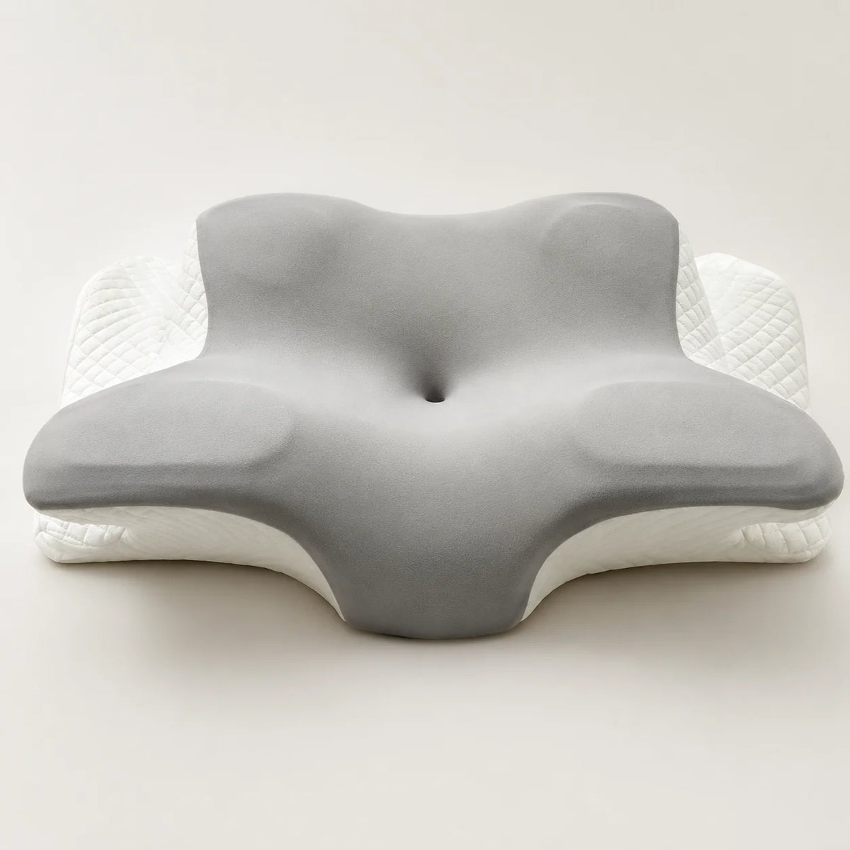 Gray and white memory foam reading pillow with arm support in butterfly shape for comfortable reading position