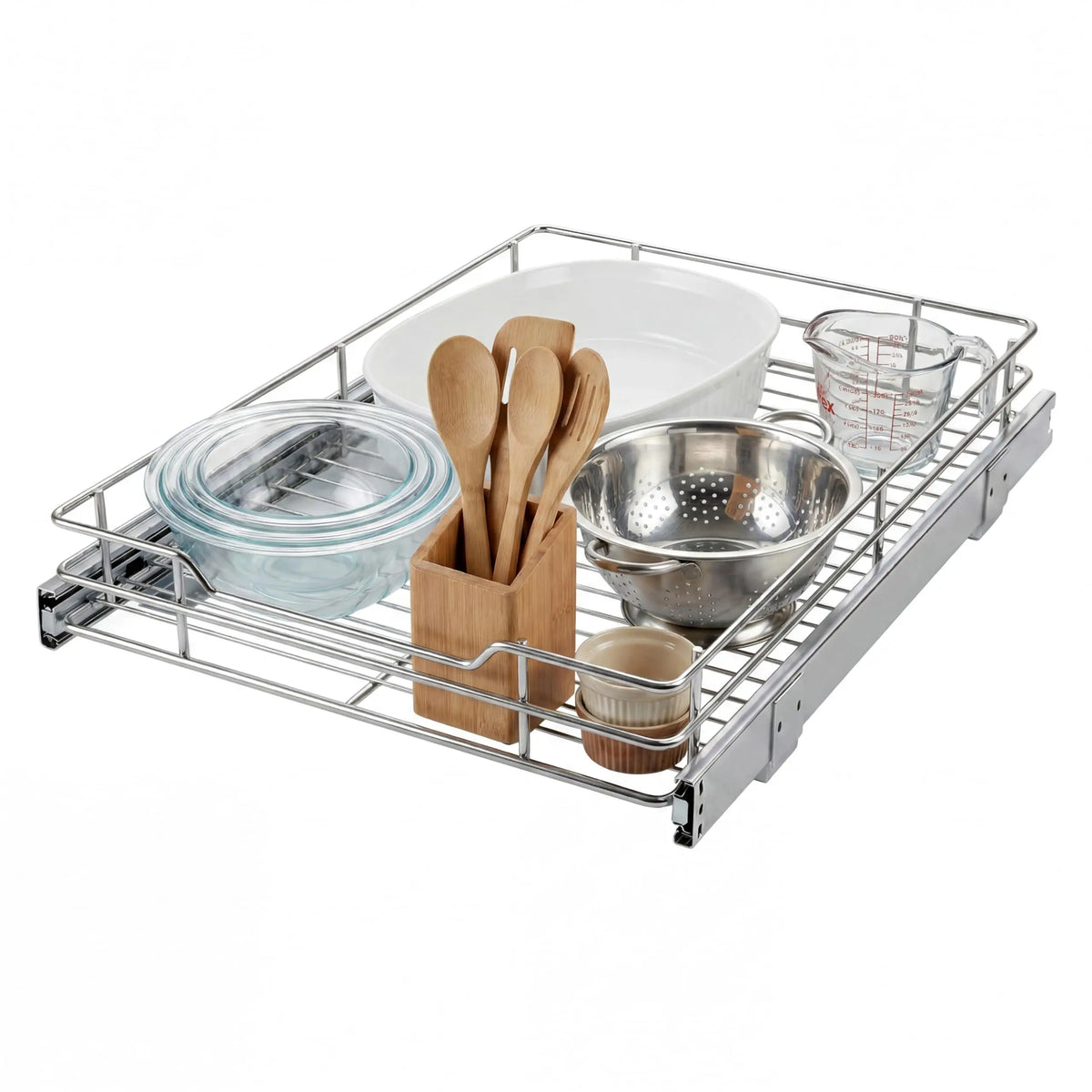 pull-out cabinet organizer displaying kitchen items including glass bowl, wooden utensils, and metal strainer on sliding shelf