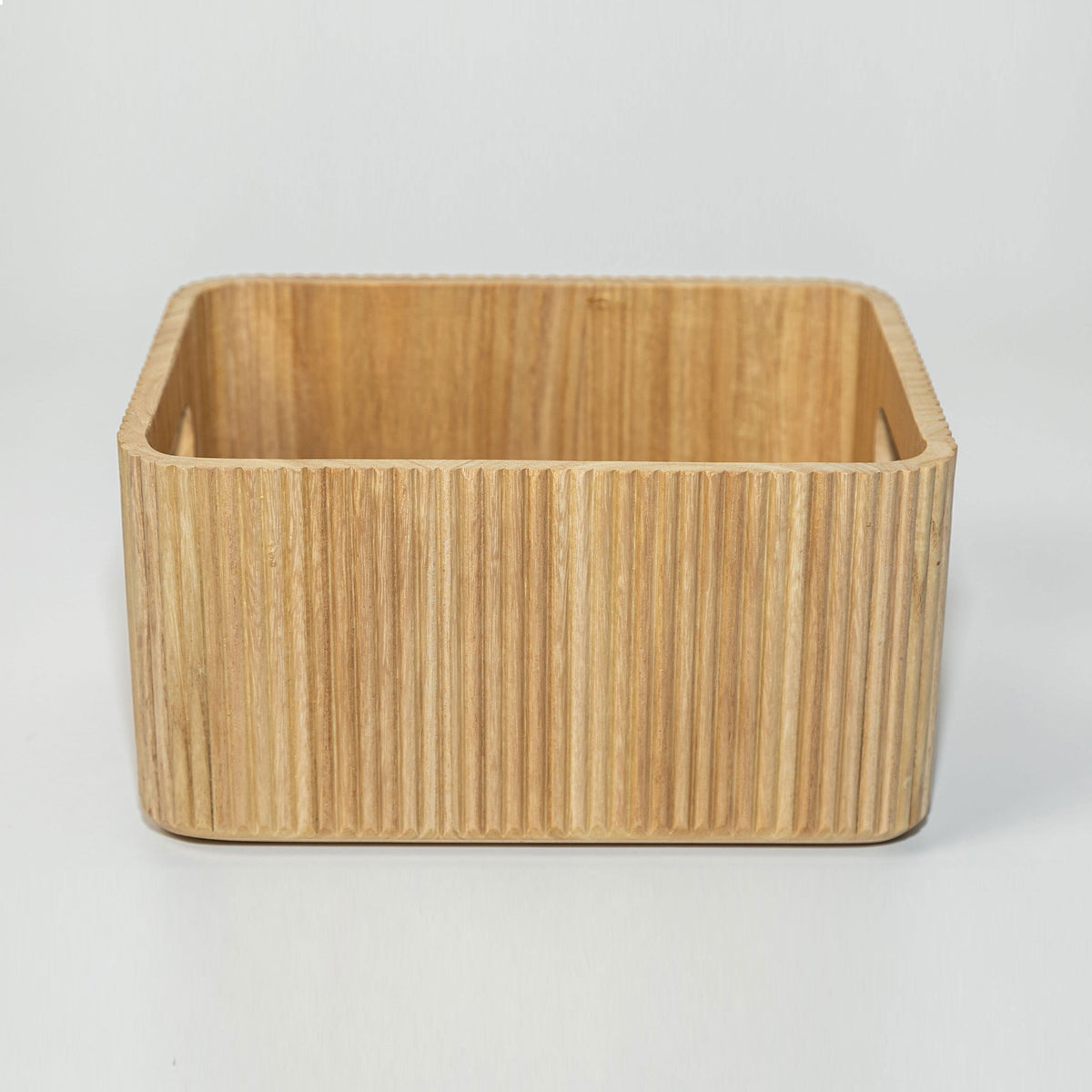 Small natural wooden ribbed storage bin