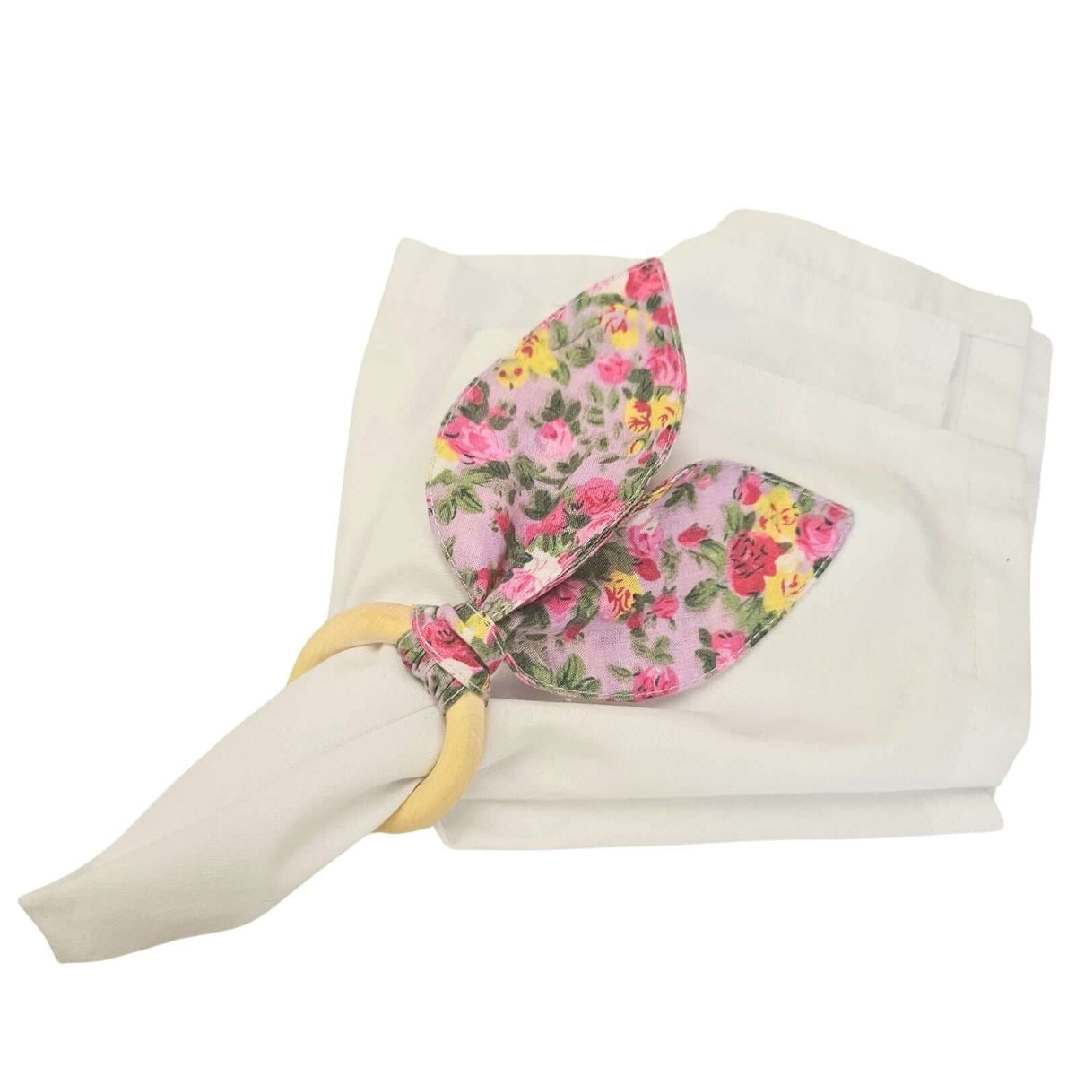 Set of four handcrafted bunny ear napkin rings in eco-friendly cotton and wood.