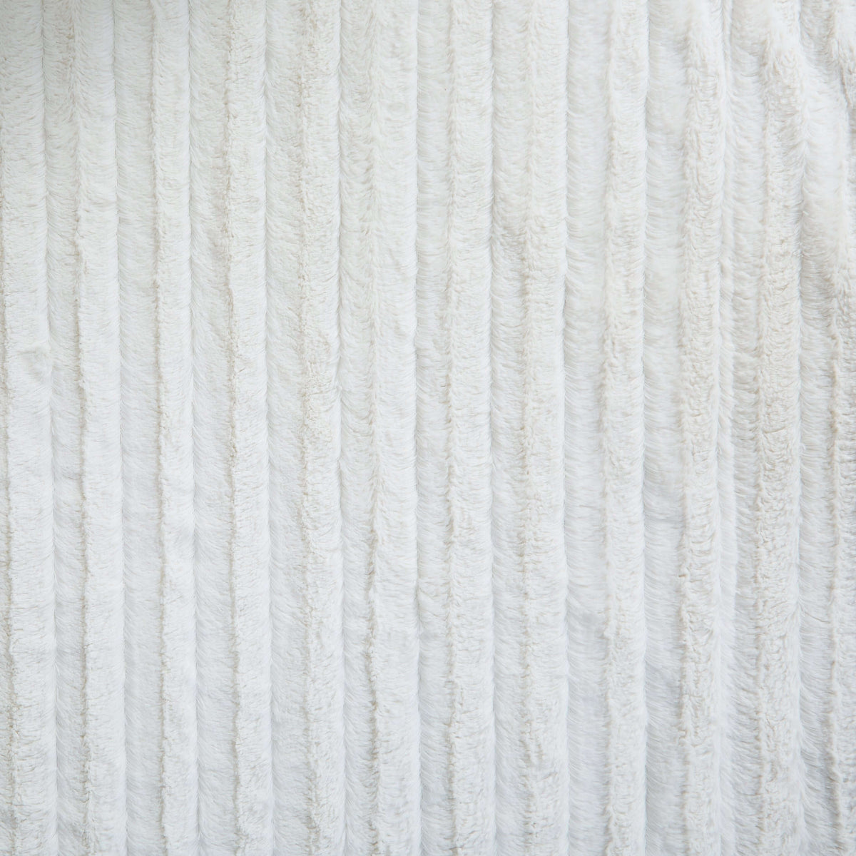 Faux fur sherpa throw blanket in white ivory showing plush texture close-up