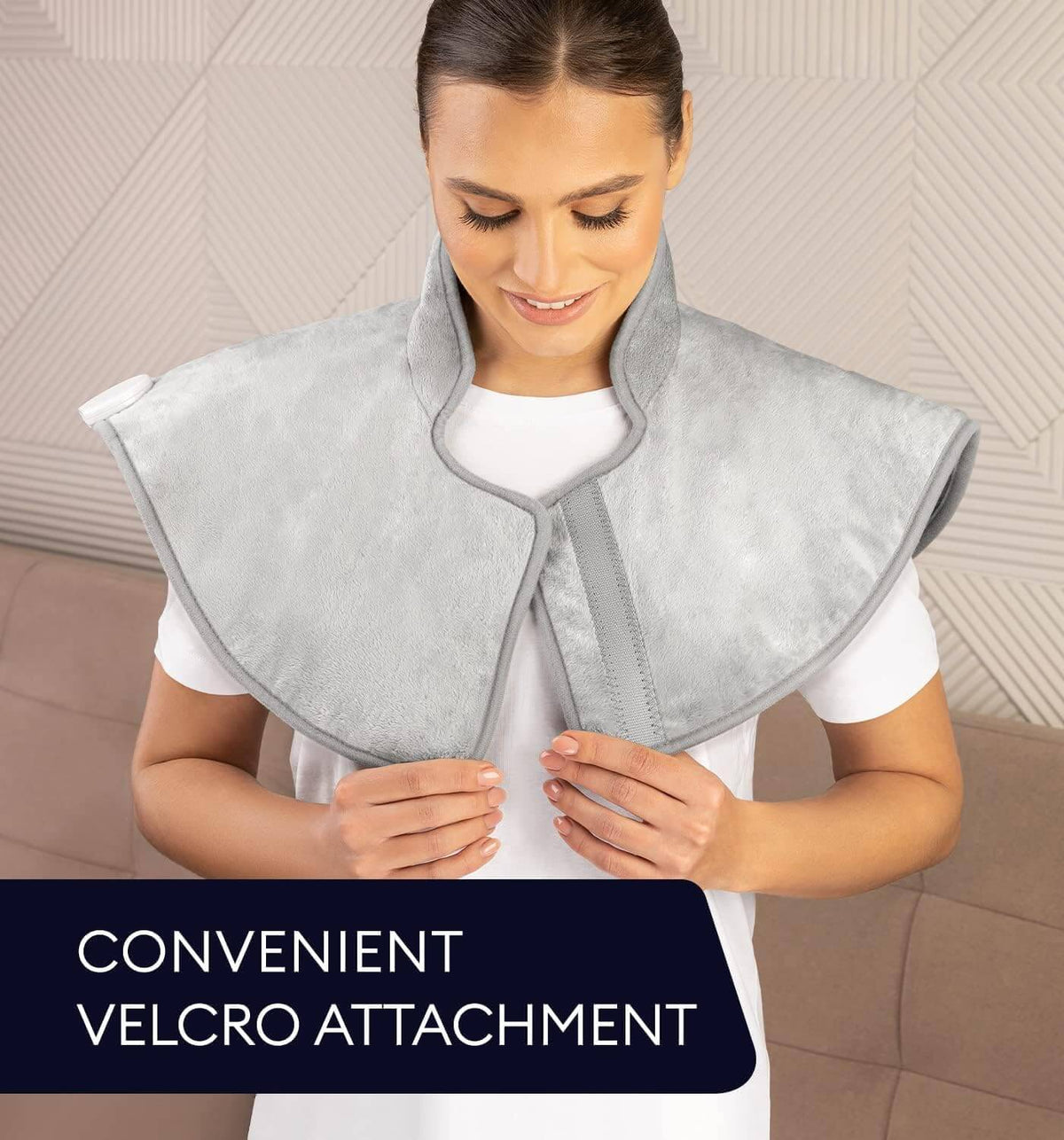 Geniani neck and shoulder heating wrap in Mist Gray with convenient velcro attachment