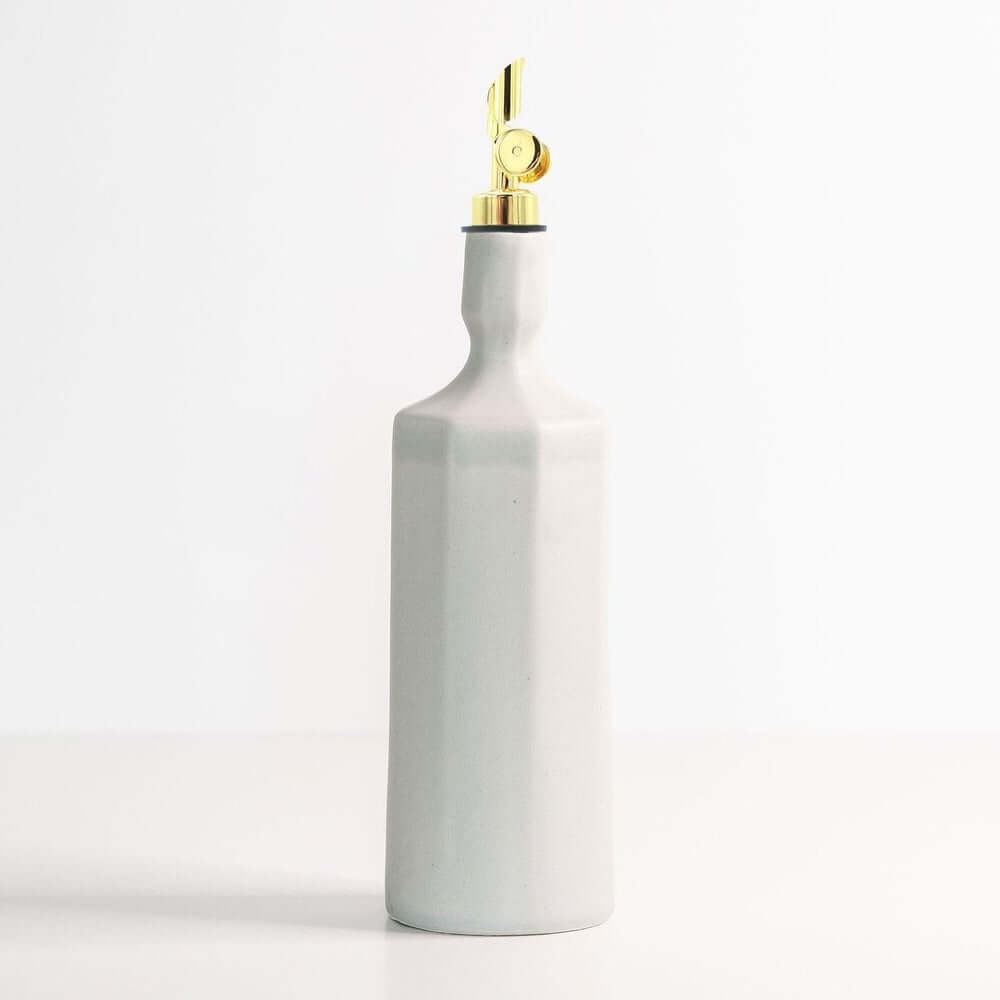 Elixir Porcelain Olive Oil Dispenser in a modern kitchen countertop setting