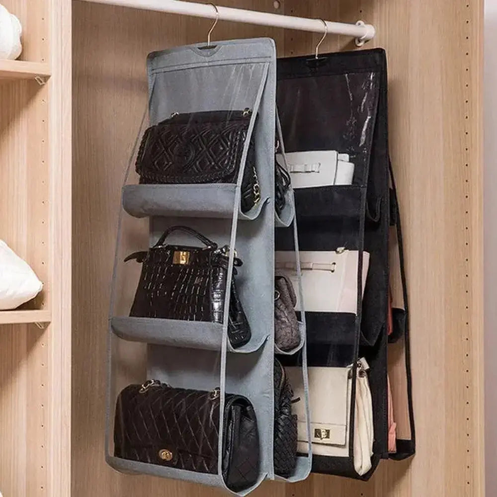 Hanging handbag organizer mounted inside a closet door.