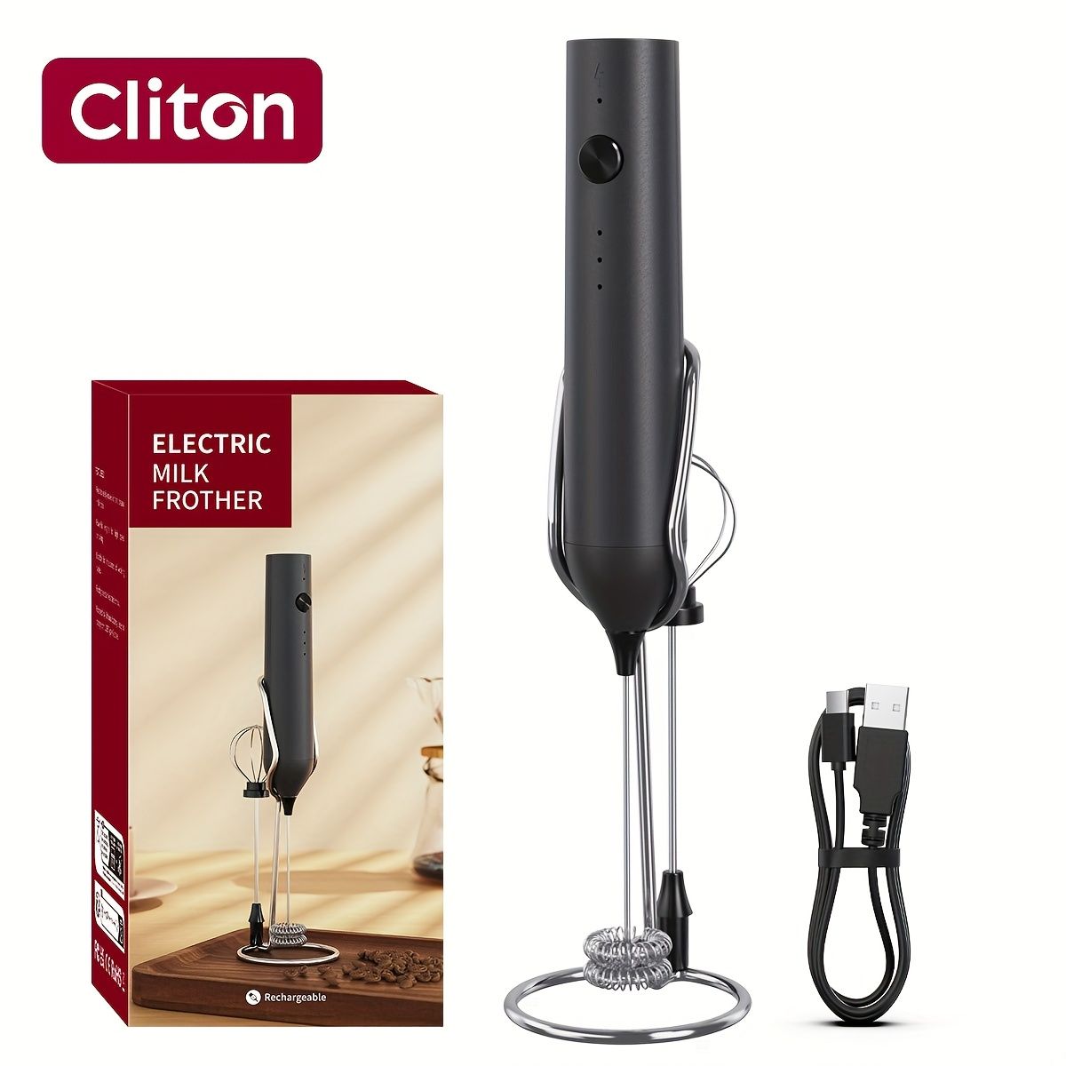 Black plastic rechargeable handheld milk frother with 2 whisk heads, stand, and USB charging cable