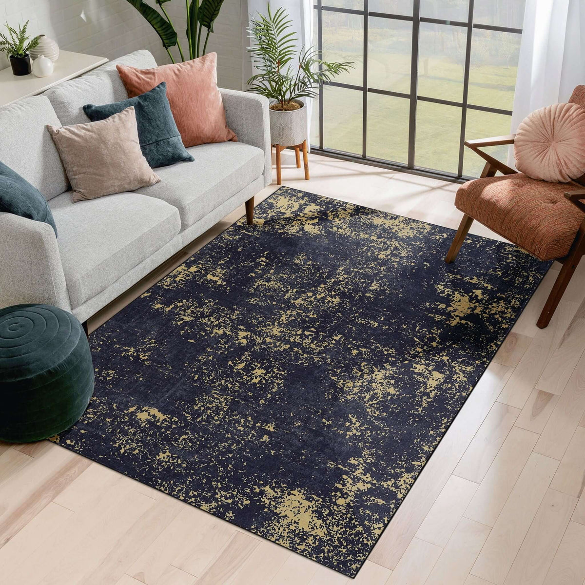 machine washable stain-resistant area rug in black with abstract design in living room