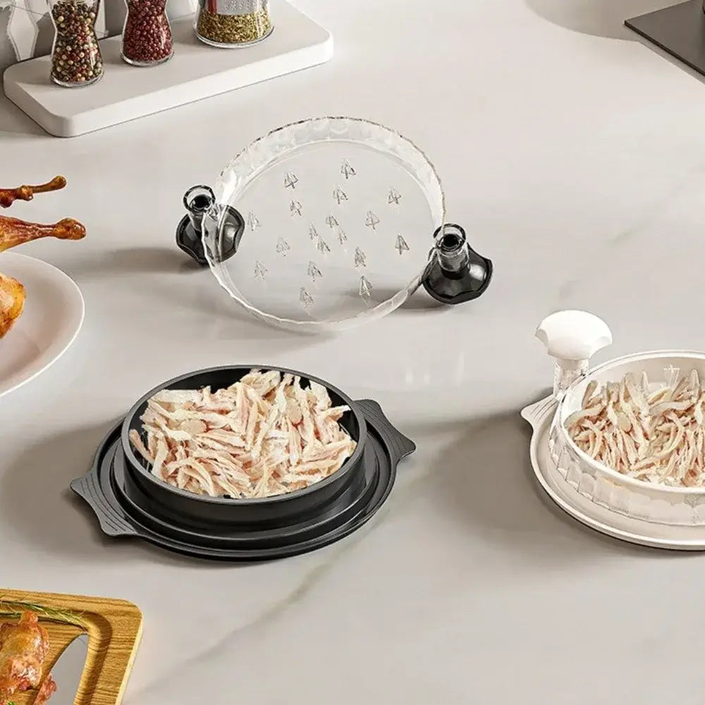 Manual Meat Shredder for Chicken and Beef shown in use with shredded meat on a kitchen counter.