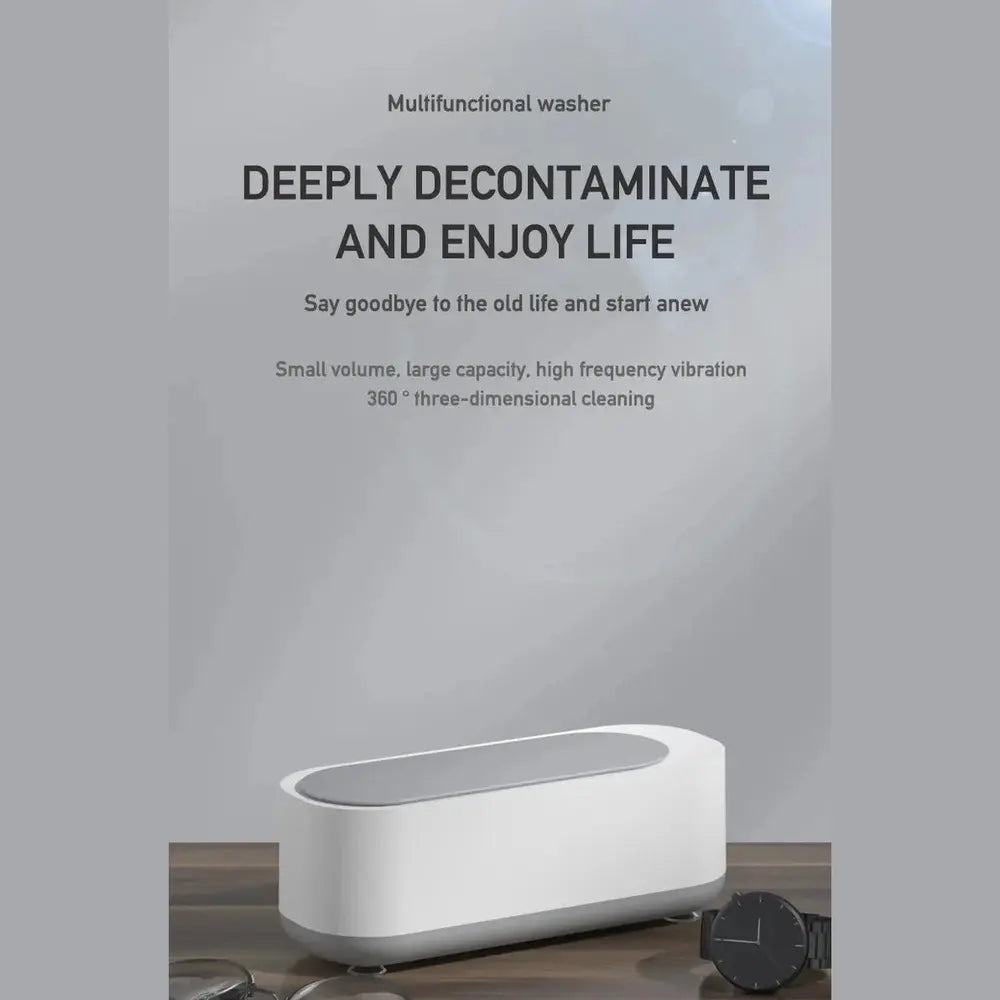 Mini Ultrasonic Jewelry Cleaner shown with rings, chains, and watches ready for cleaning