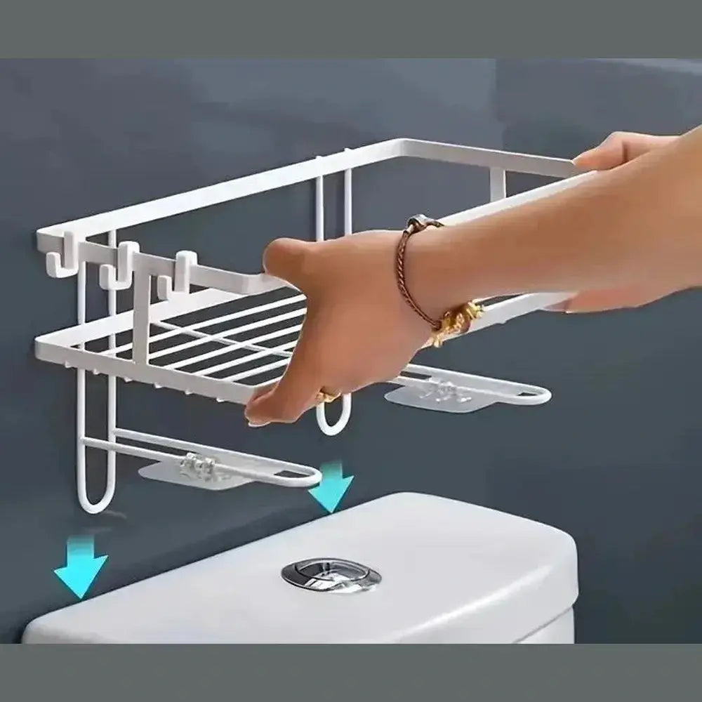 Person installing an over-the-toilet storage shelf for space-saving bathroom organization.