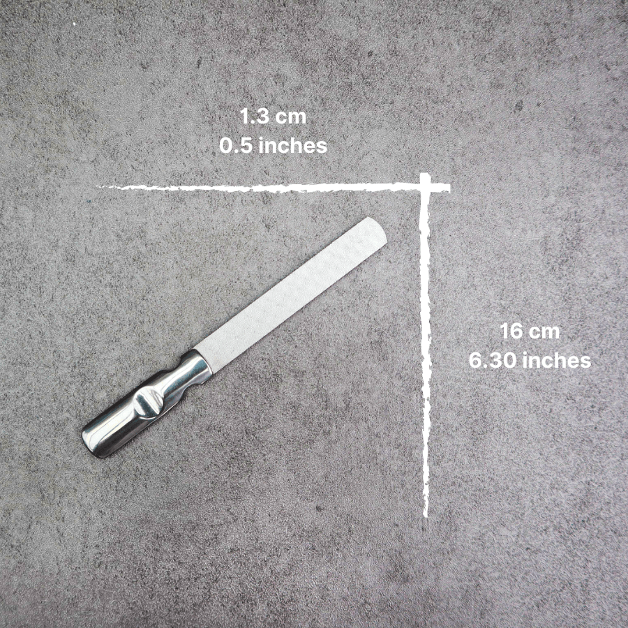 Pet grooming kit nail file with measurements on a gray background