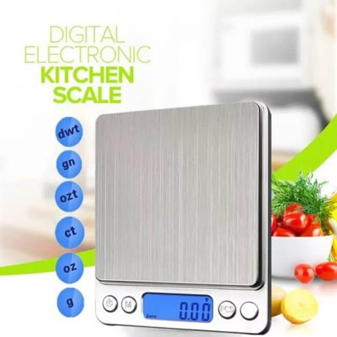 Precision digital kitchen scale with 0.1g readability and a tare function.