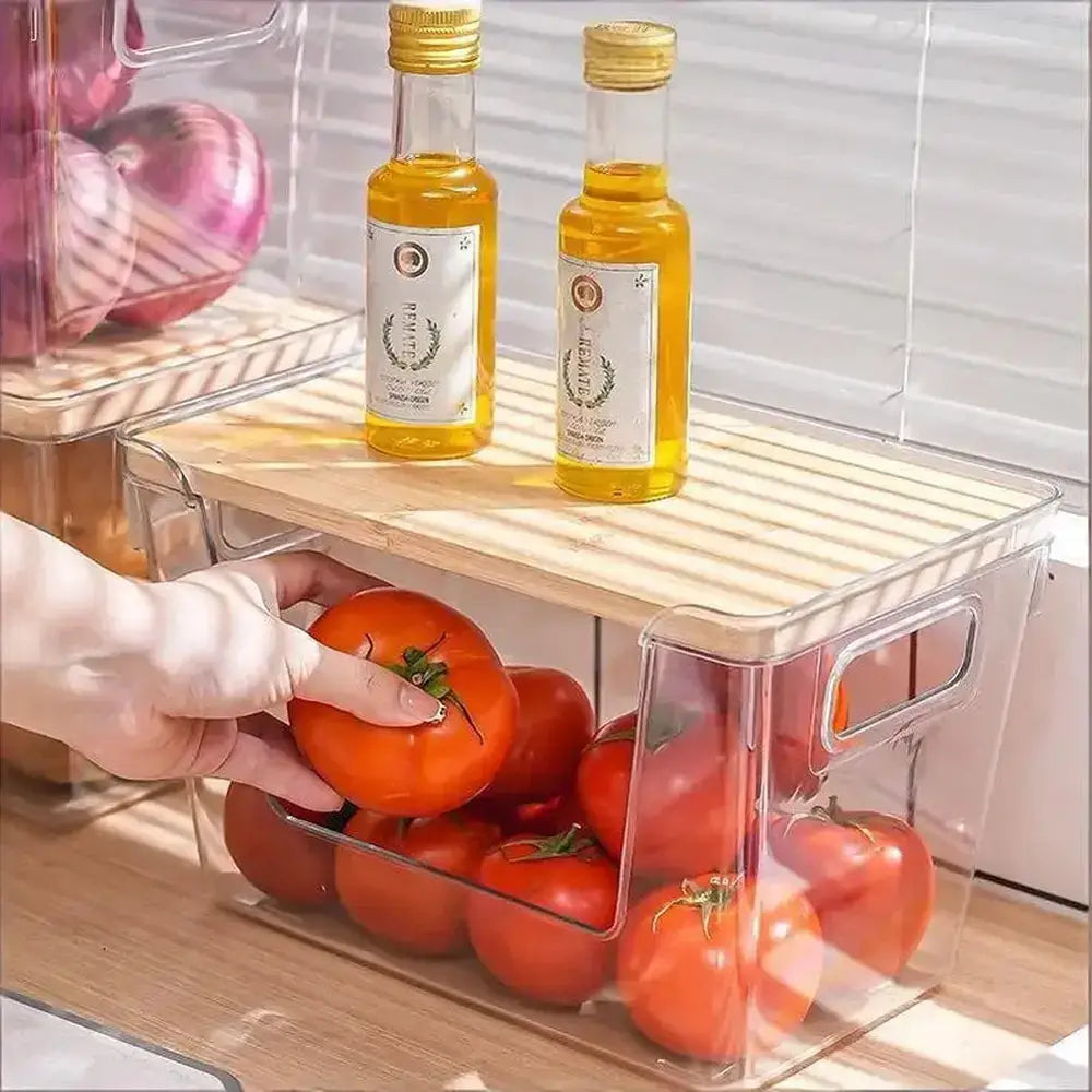 Clear pantry organizer bins with bamboo lid storing tomatoes and oil for a tidy kitchen.