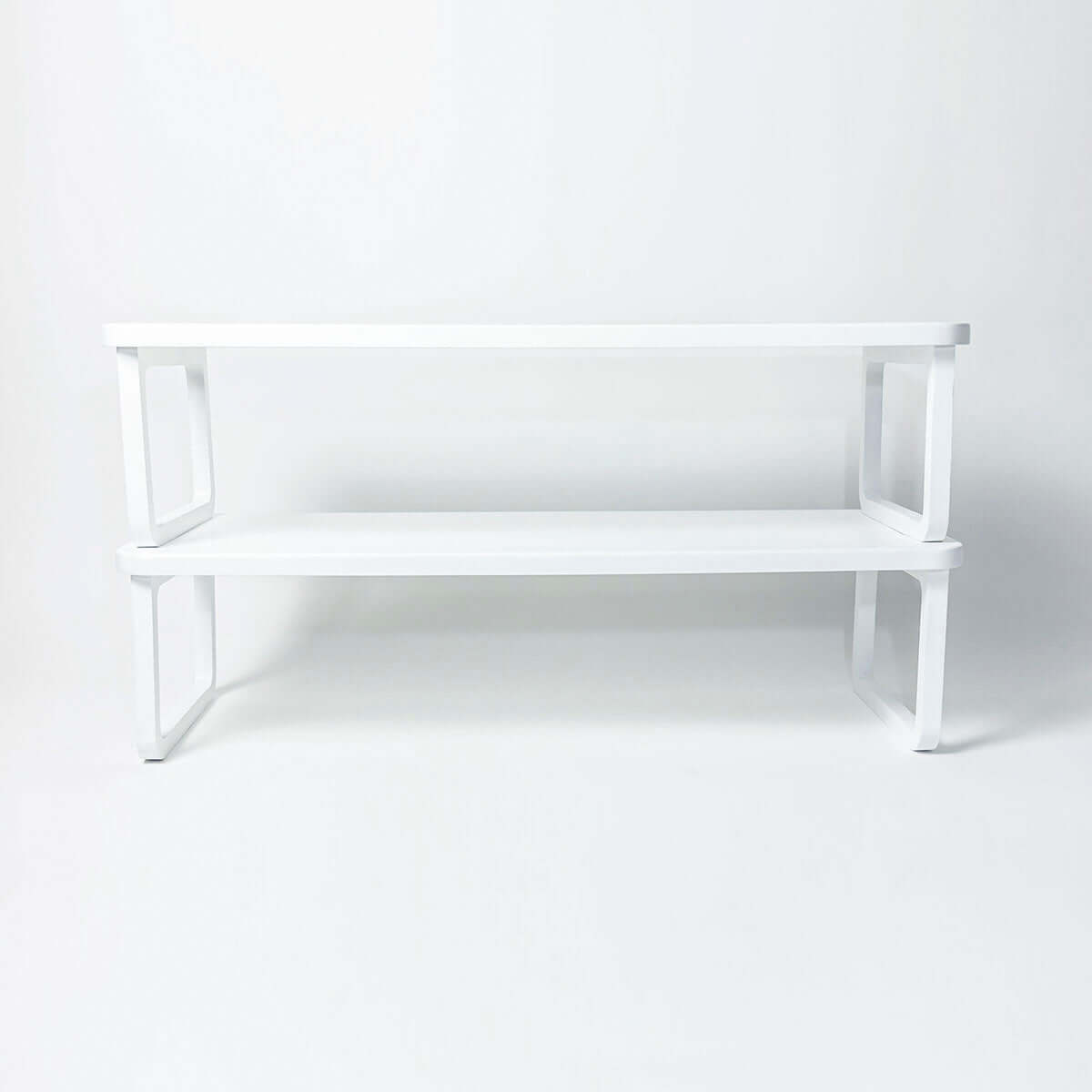 stackable white wooden shoe shelf with two flat solid shelves for storing shoes