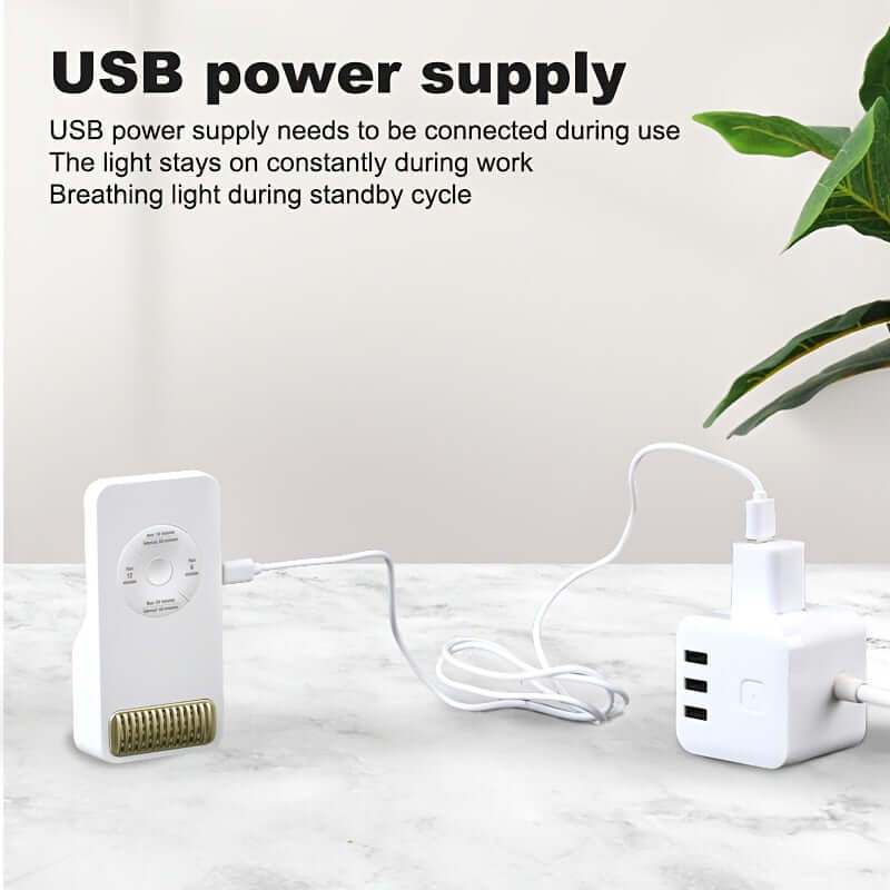 Compact USB air purifier for desk demonstrating USB power supply connection and functionality on a workspace surface.