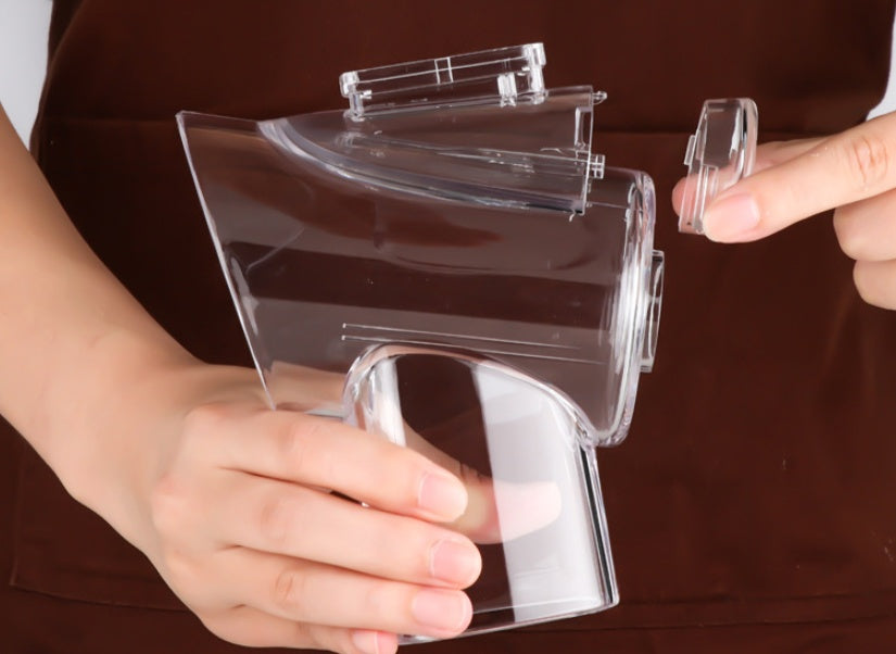 mandoline vegetable slicer with multiple interchangeable blades held in hands showing multifunctional design