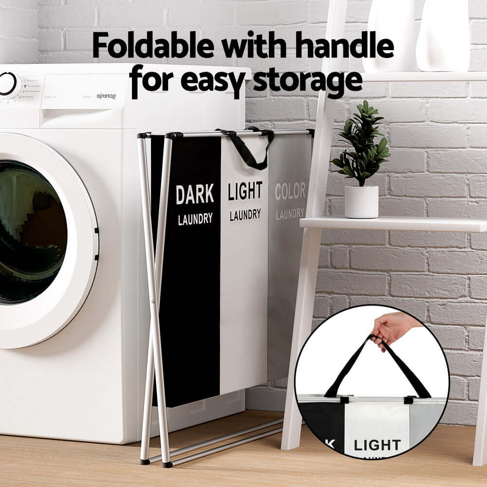 3-section foldable laundry hamper with a detachable aluminum-alloy frame, carry handle, and compartments for sorting lights, darks, and colors.