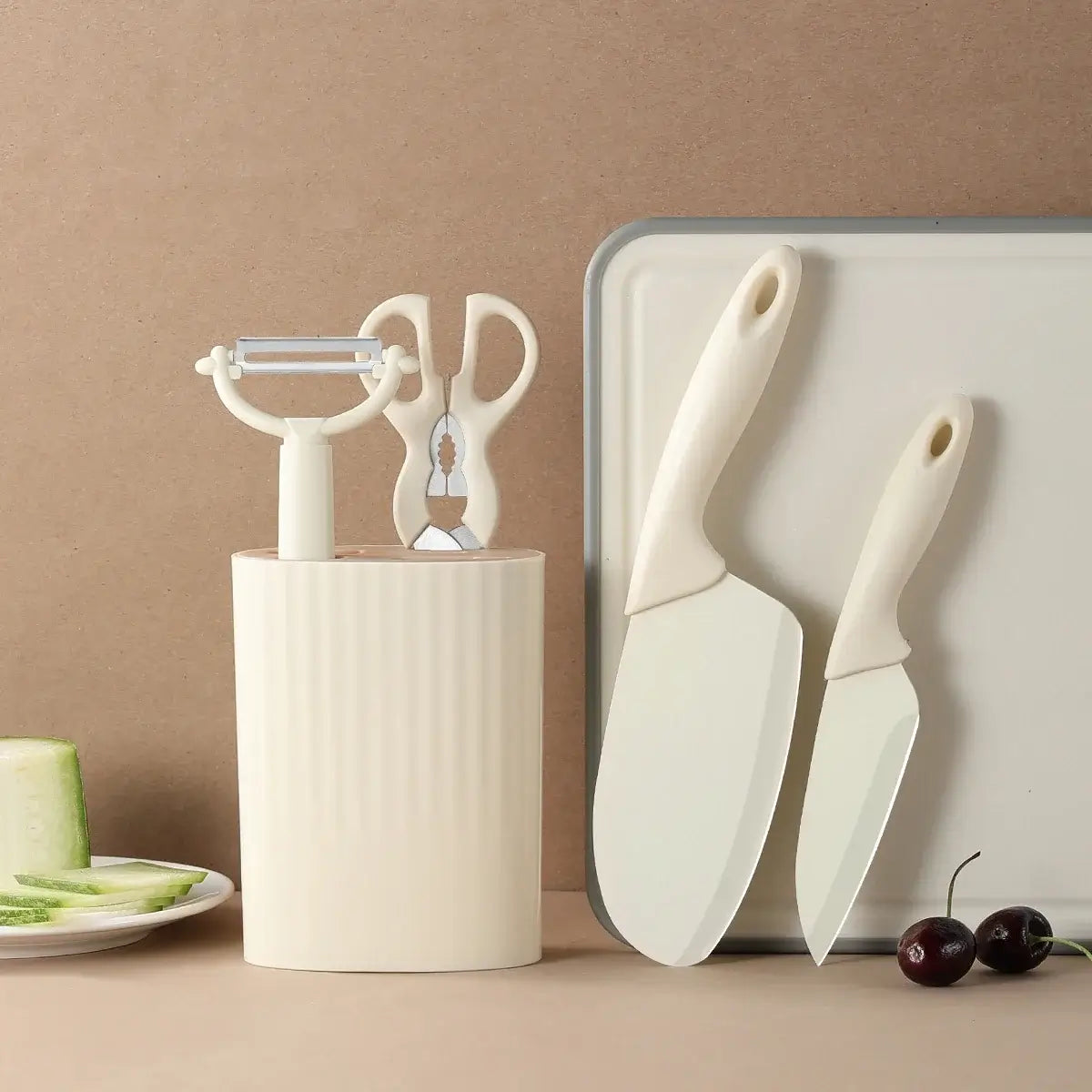 5-piece kitchen knife set with scissors, peeler, and storage block for efficient kitchen prep.