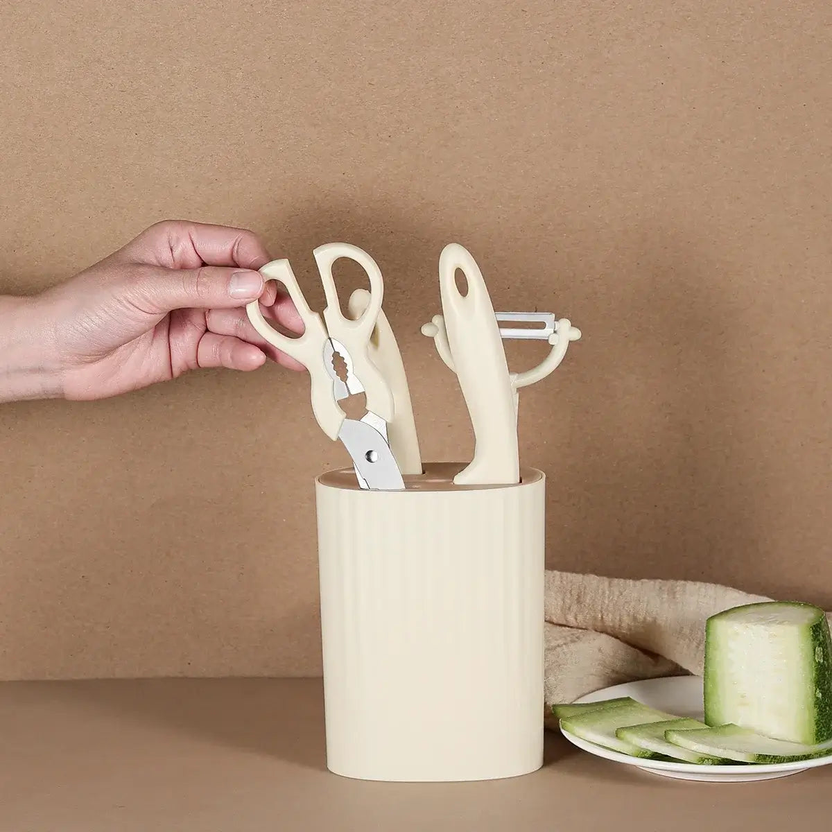 5-piece kitchen knife set with scissors, including kitchen scissors and peeler in a stylish storage block.