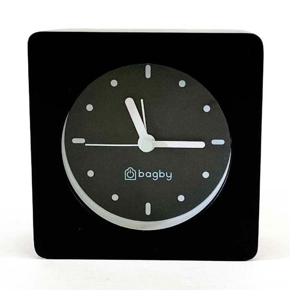 Silent wooden alarm clock with night light in black, designed for a calm and distraction-free bedroom.