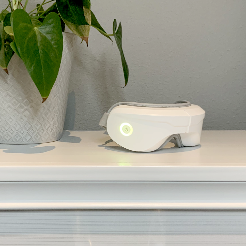 Relaxable heated eye massager in use