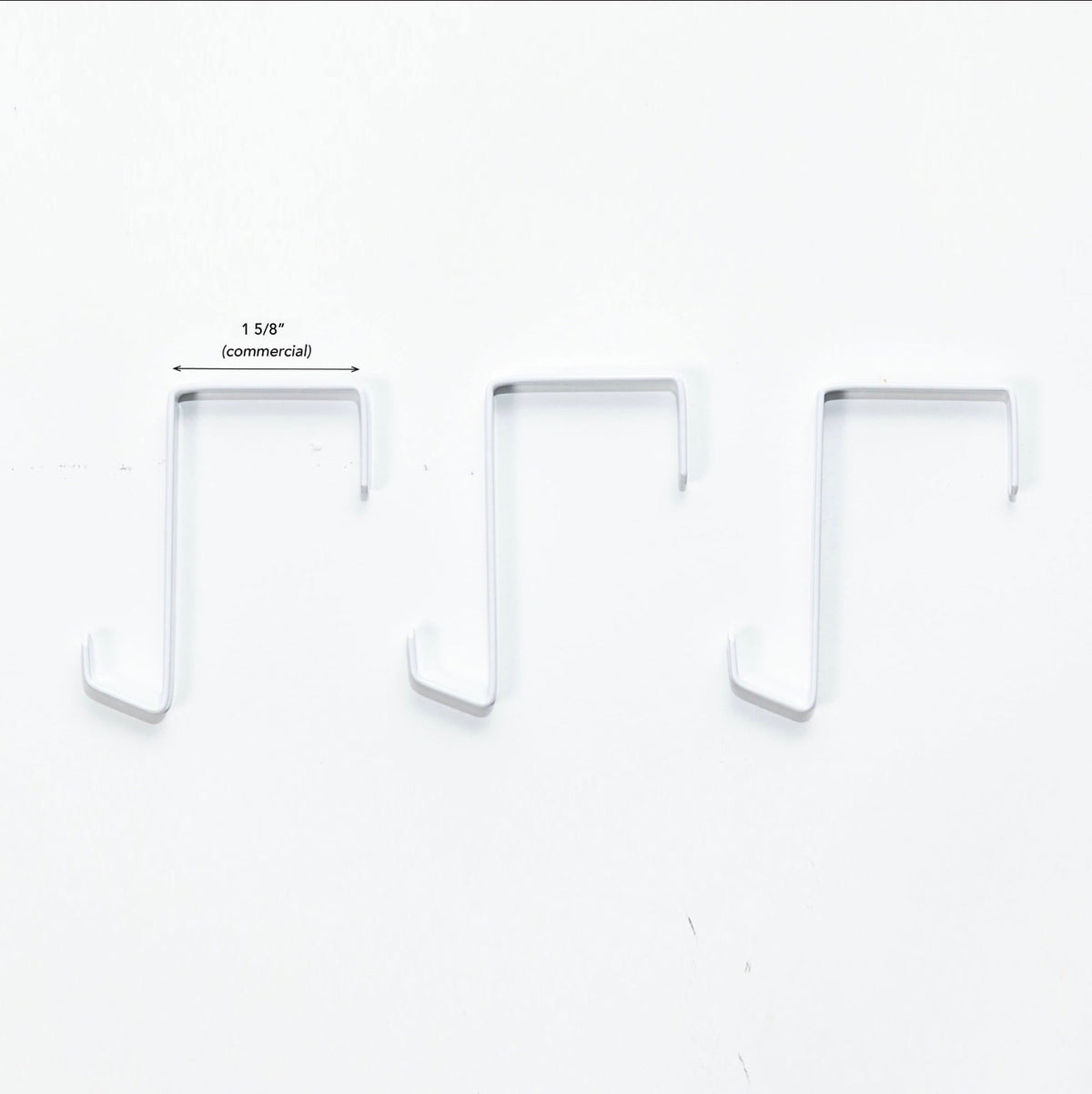 Three white over-the-door hooks, commercial 1 5/8 inch size