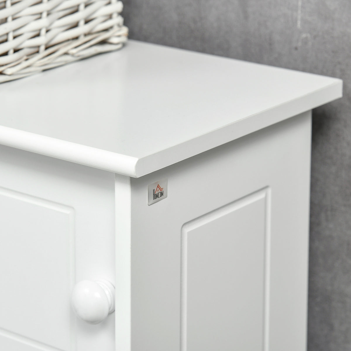White over-the-toilet storage cabinet with sliding doors for small bathroom organization