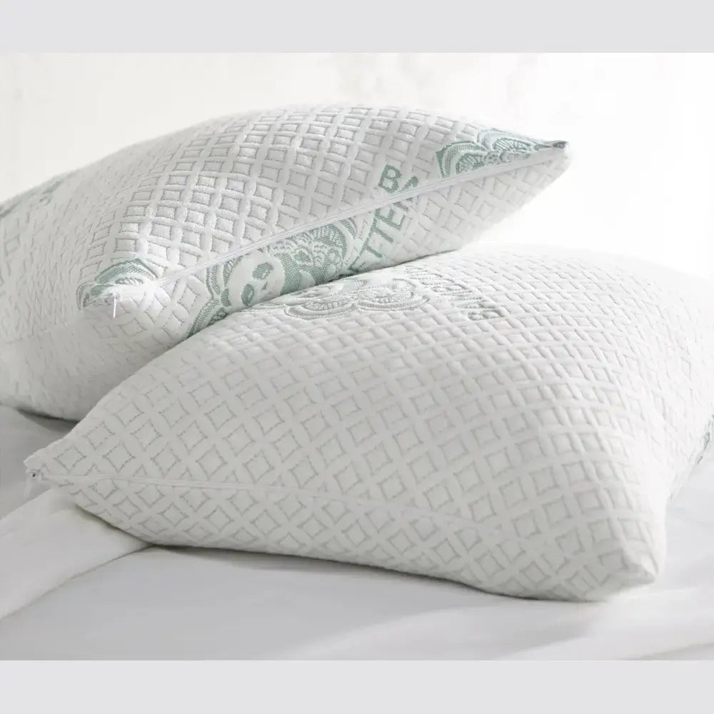 Adjustable Bamboo Cooling Pillow shown in Queen and King sizes side by side on a bed