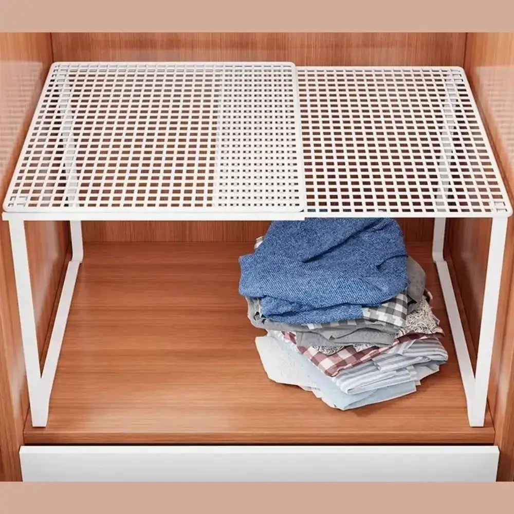 Adjustable closet shelf organizer with stacked clothes, perfect for maximizing storage space.