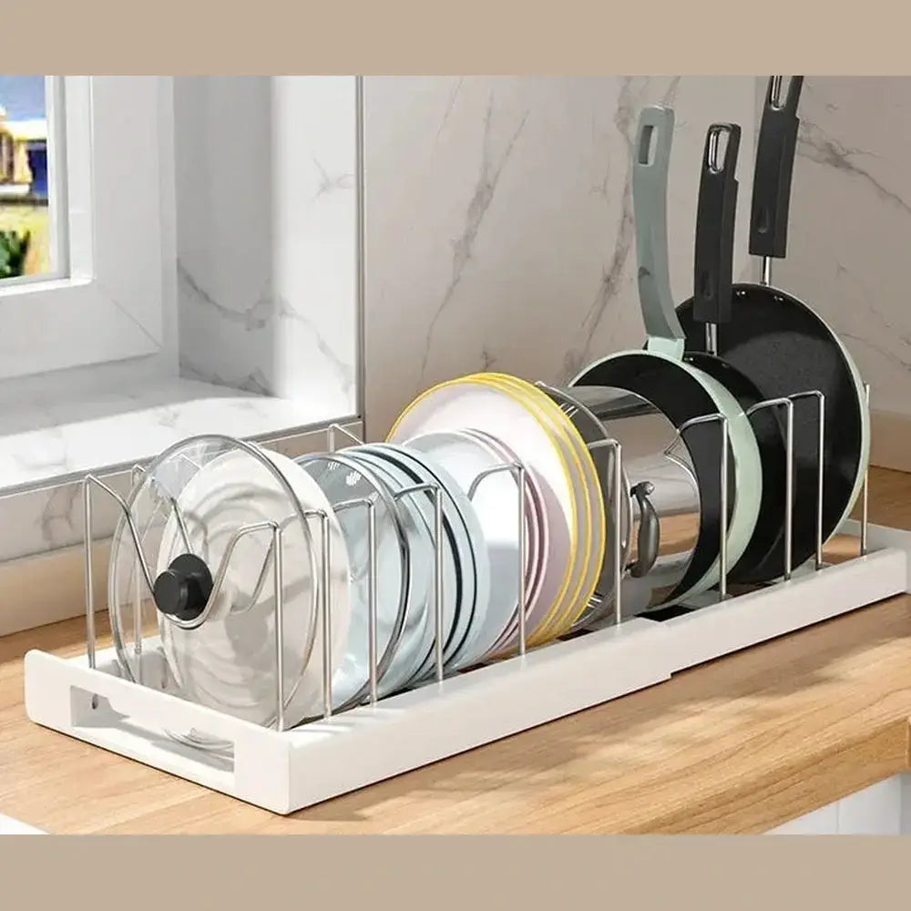 Adjustable pot and pan organizer displaying pots, pans, and lids neatly arranged for easy access and organization.