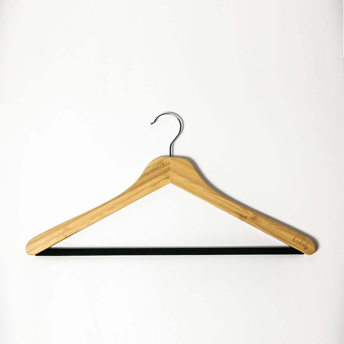 Bamboo hangers with non-slip velvet bar featuring natural wood construction and black velvet bar to prevent clothes from slipping