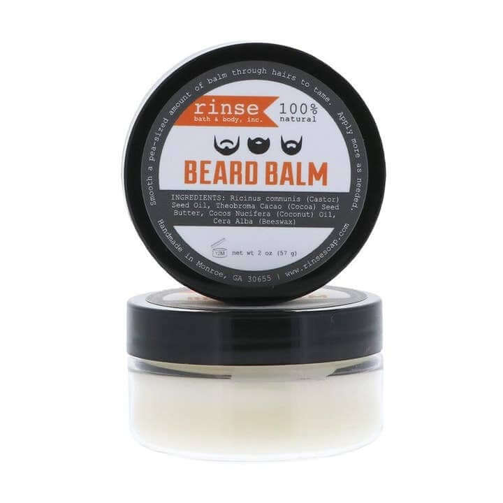 Tin of beard balm with a screw-top lid for daily beard conditioning.