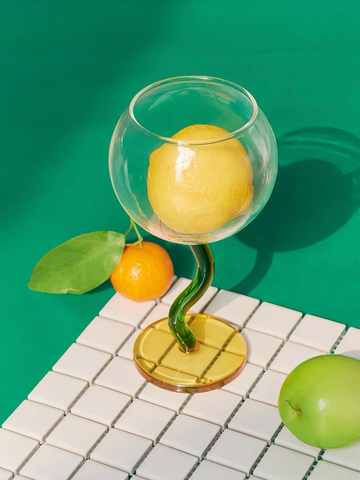 Close-up of a bubble wine glass's bubbled base and wavy stem detail.