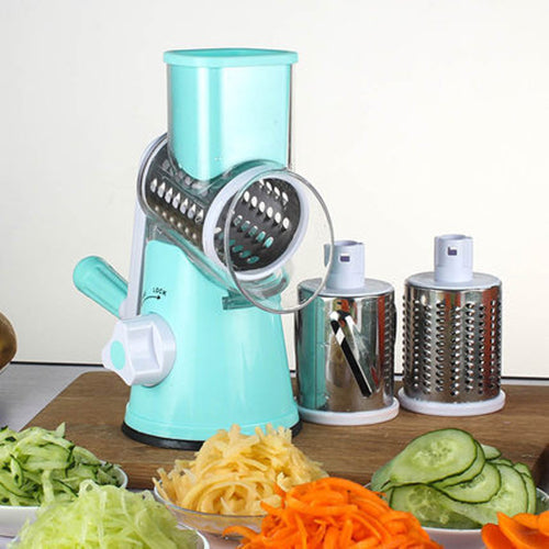 mandoline vegetable slicer with interchangeable drums creating consistent slices of vegetables and cheese for meal prep