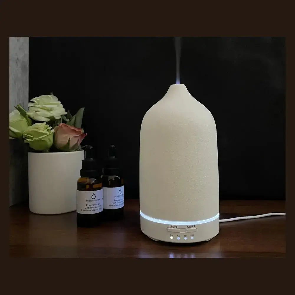 color-changing ceramic essential oil diffuser with LED light and essential oils