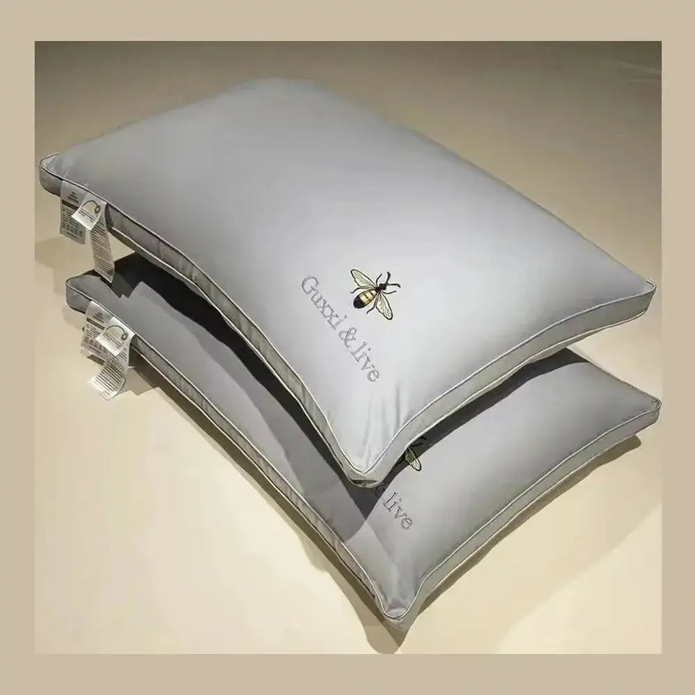 Cervical massage pillow shown from above, highlighting its ergonomic contoured shape.