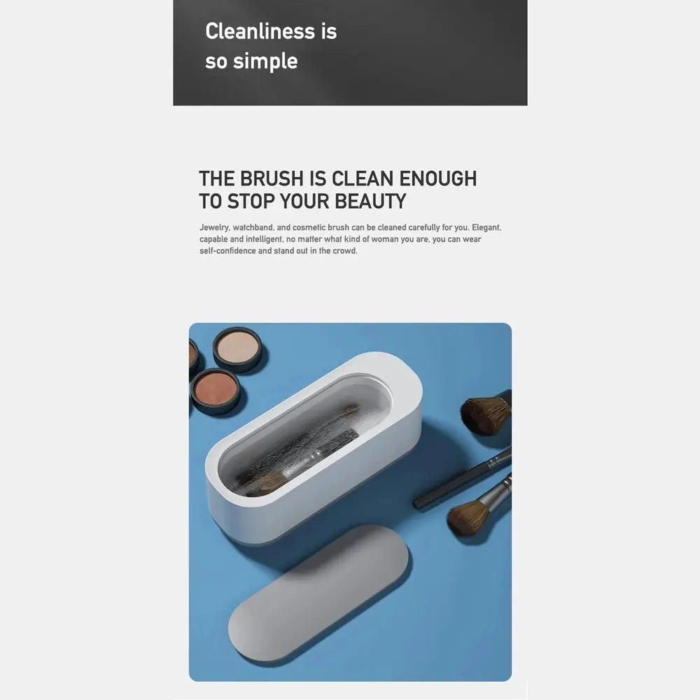 Mini Ultrasonic Jewelry Cleaner on a white background with battery compartment shown