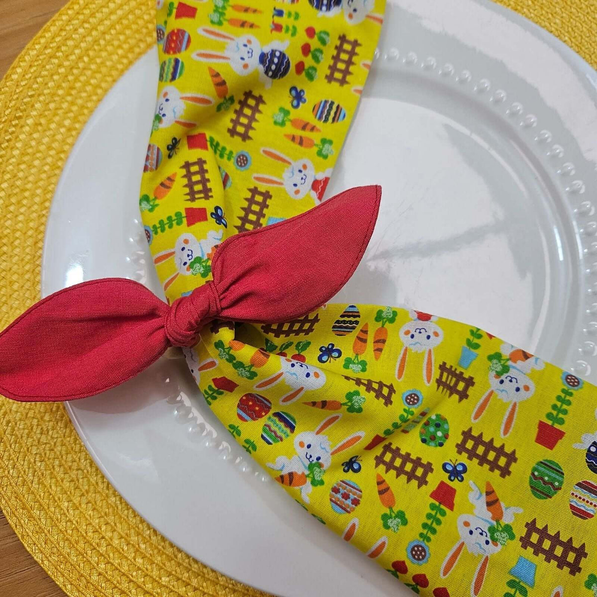 Set of soft cotton napkins with an Easter bunny motif for spring tables, machine washable and reusable.