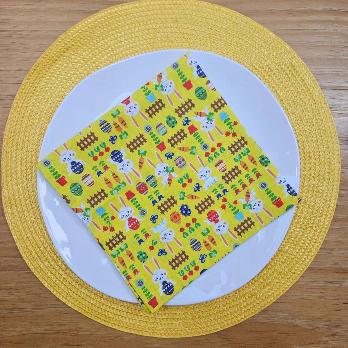 Set of soft cotton napkins with an Easter bunny motif for spring tables, machine washable and reusable.