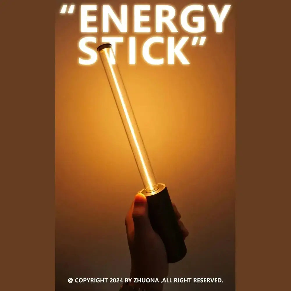 Rechargeable LED night light geometric bar held, glowing warmly.