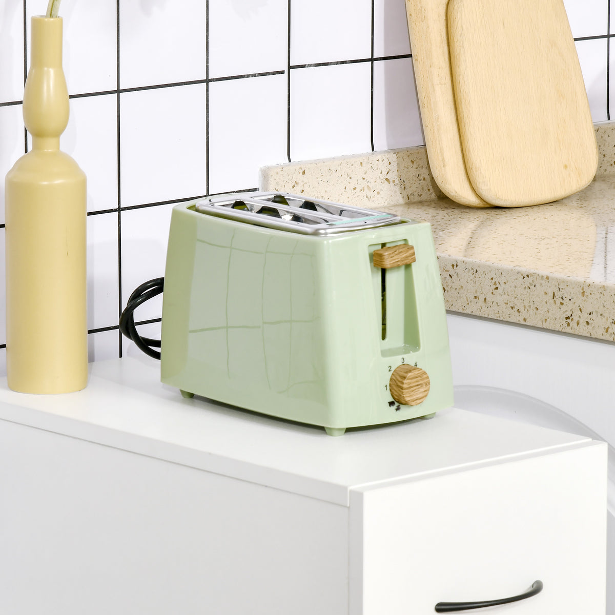 slim rolling storage cart with drawer in white, displayed in a kitchen beside a toaster for compact storage solutions