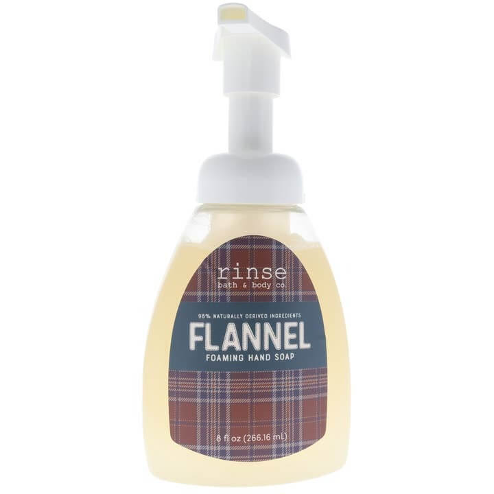 Bottle of flannel-scented foaming hand soap with a pump dispenser.