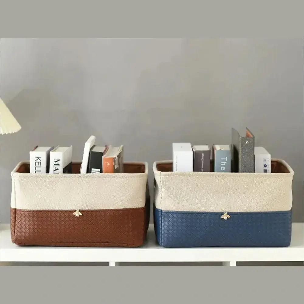 Foldable storage basket with metal frame in brown and blue, holding books on a shelf for organized clutter solutions.
