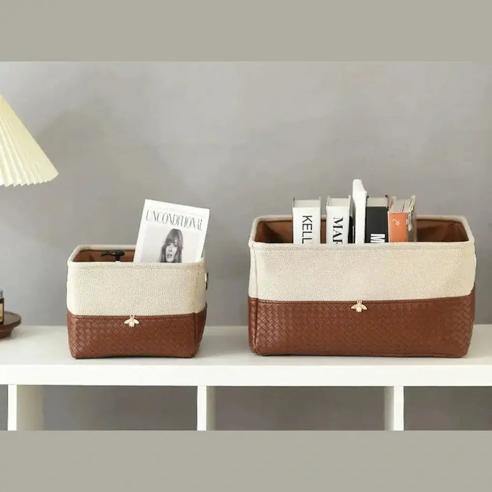 Foldable storage basket with metal frame in two sizes, neatly organizing books and magazines on a shelf.