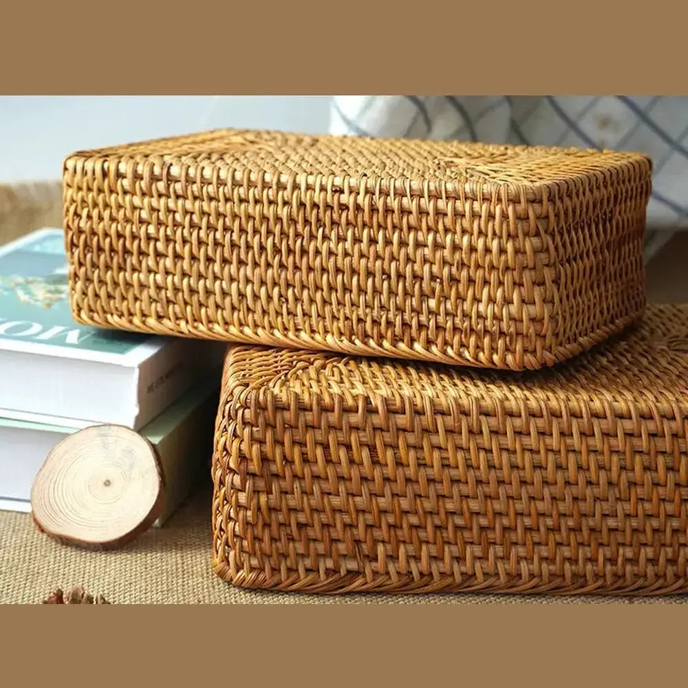 Set of handwoven rattan storage baskets nested together for compact storage.