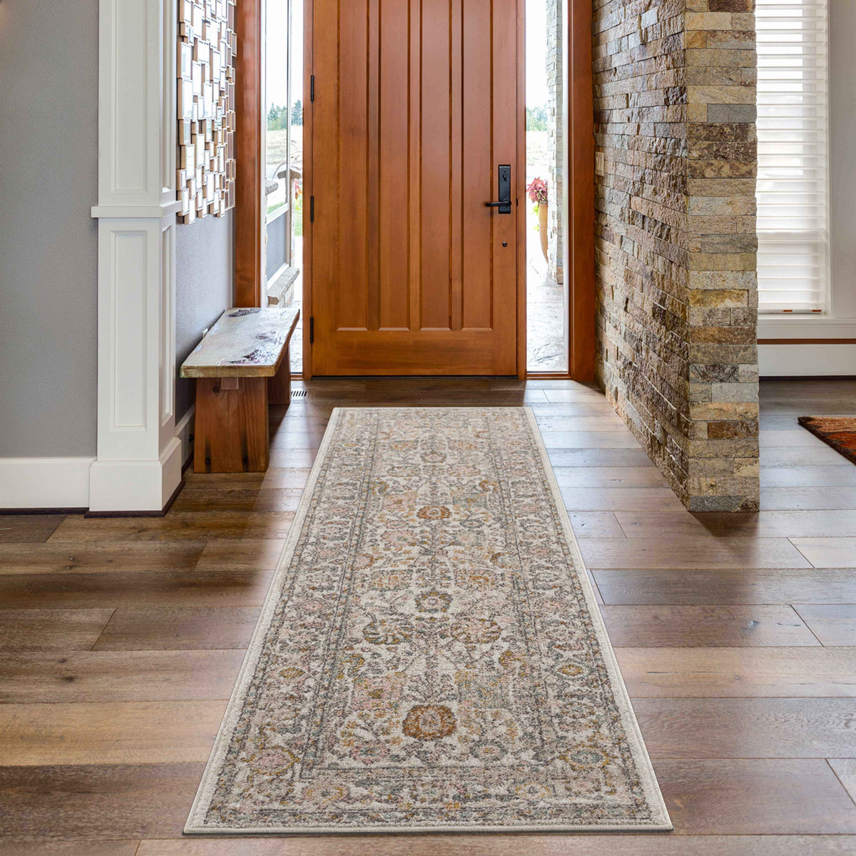 Elegant area rug placed in a modern entryway, enhancing warmth and style in home décor.