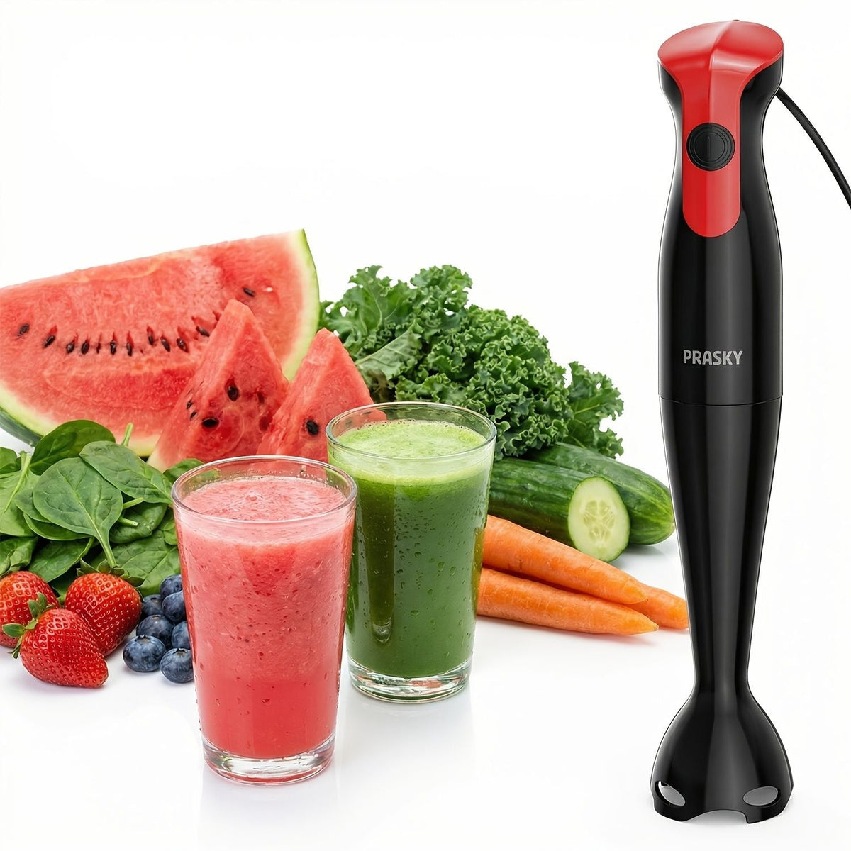 Red and black electric hand blender with detachable shaft blending fresh fruit smoothies and vegetables