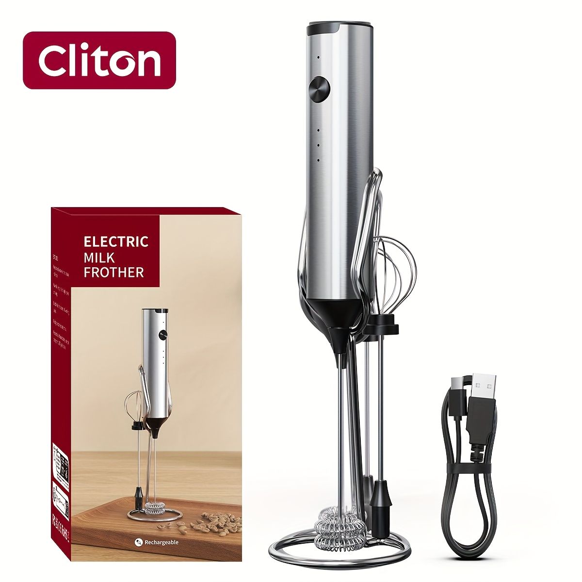 Rechargeable handheld milk frother with stainless steel construction, two whisk heads, and USB charging cable displayed with packaging
