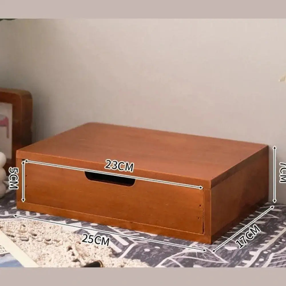 Wooden desk organizer with drawers for easy access to office supplies.